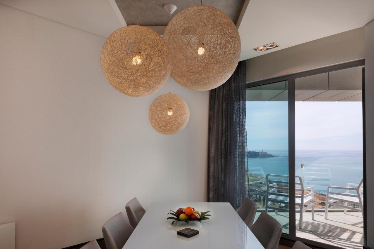 Royal Beach Hotel Tel Aviv By Isrotel Exclusive Exterior photo A dining room